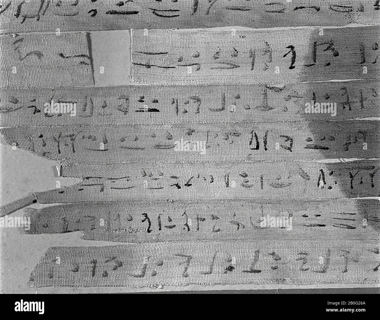 unclear, Djedhor, 1 strip, demotic, A) Mode of framing: stuck on a piece of cardboard, covered with plastic. Assembled together with AL 51 sheet 6, B) Layout, 1. number of columns or lines of text: 1 mummy wrap, 2. type of writing: demotic, 3. ink color: black, no rubrum, 4. reading direction: right to left, 5. number and place of the vignettes: no vignette, 6. color vignettes: n / a, C) Description Stock Photo