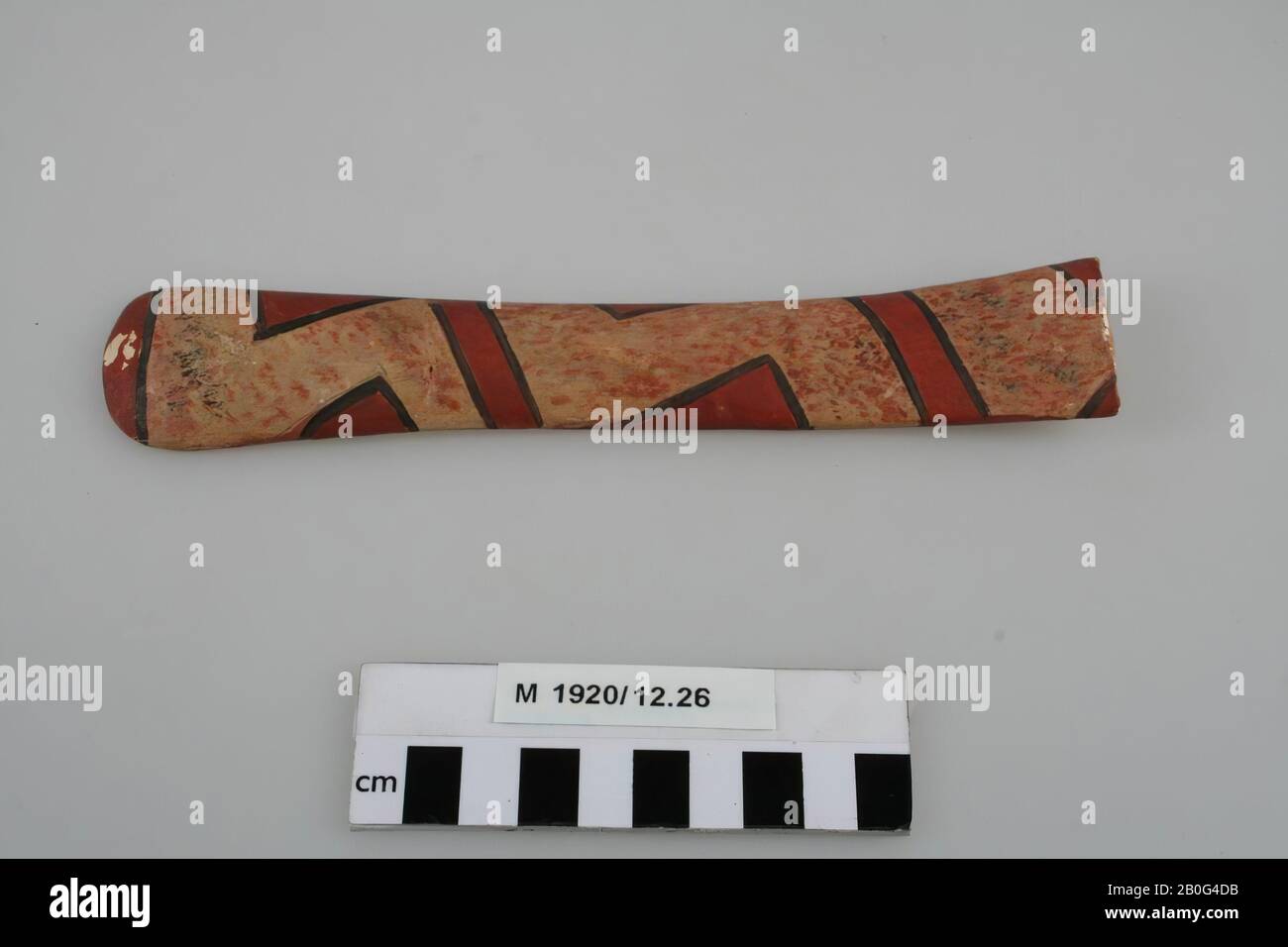 Casting of a handle, painted with red motifs, black outlined, casting, handle, plaster, h: 19.5 cm, diam: 3.5 cm, prehistory, Germany Stock Photo