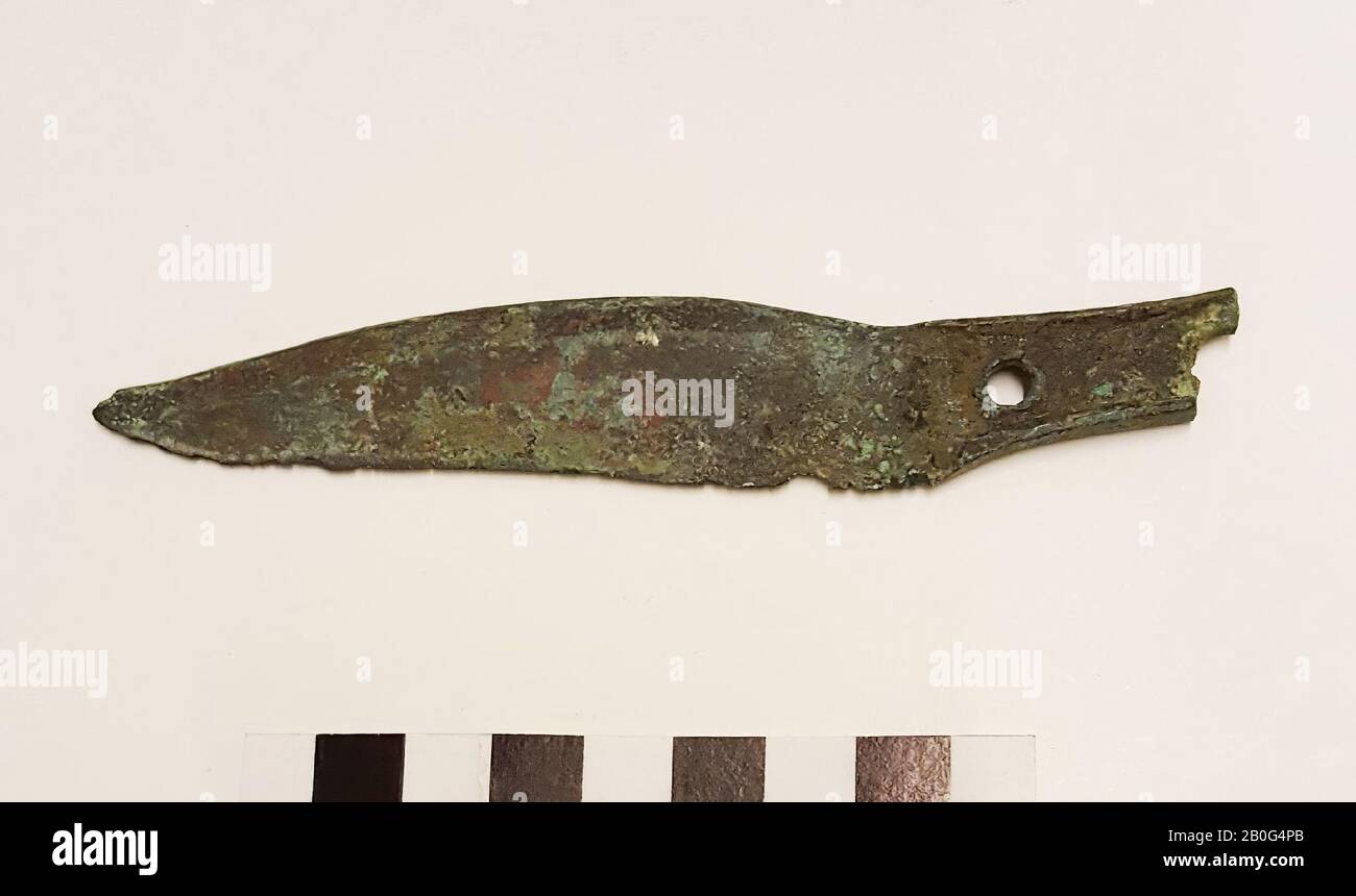 Bronze knife. Heft lost. Two rivet holes remain. Austria, Hallstatt, knife, metal, bronze, 12.1 x 2.0 x 0.3 cm, Austria Stock Photo