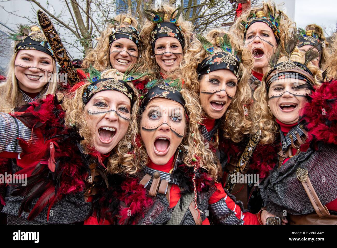 Dietfurt, Germany. 20th Feb, 2020. Women in Chinese costumes take part in  the traditional Chinese carnival procession. As every year on "Nonsense  Thursday", fools dressed as Asians parade through the town. The