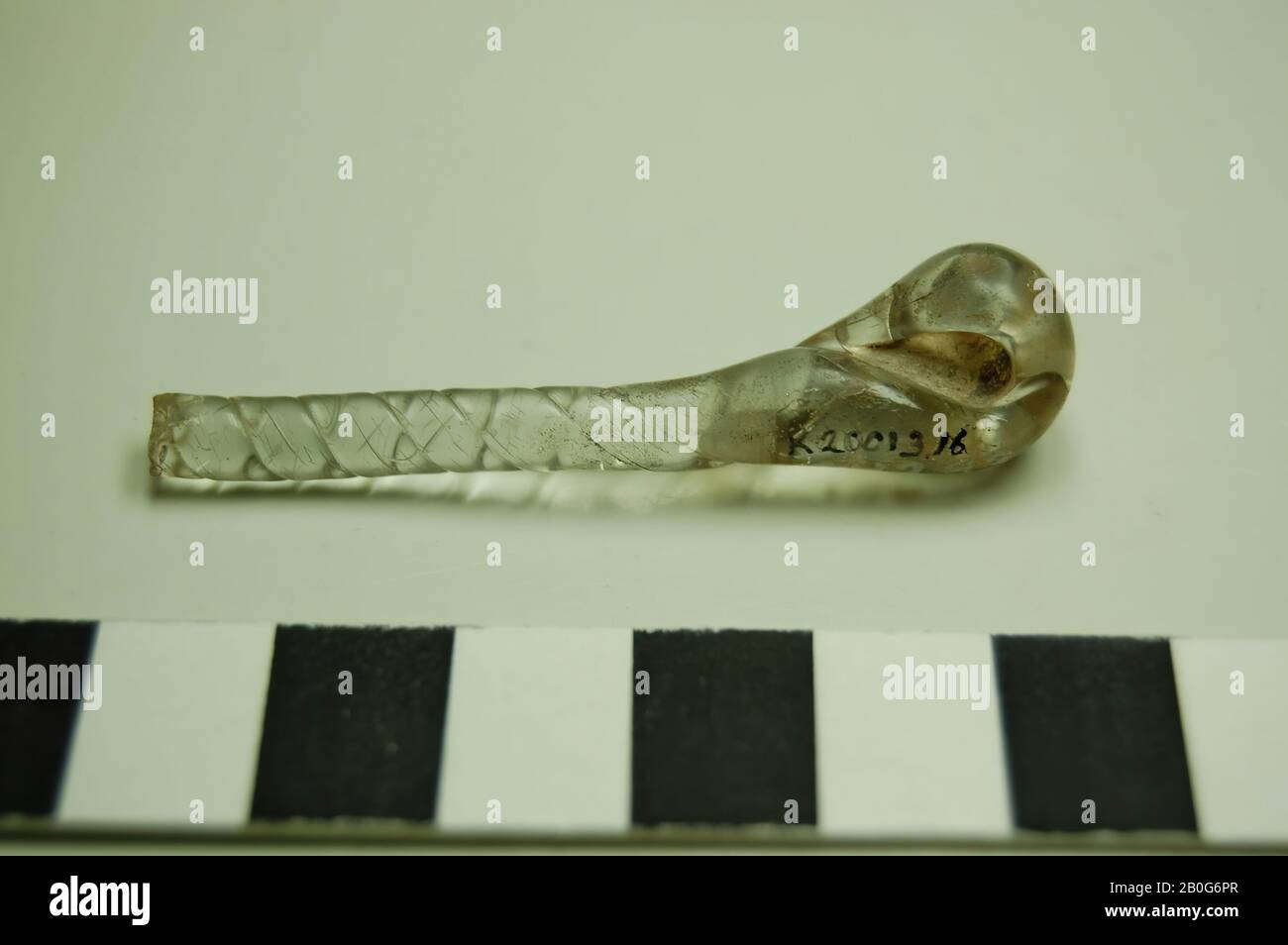 Glass shard of transparent glass with air bubbles and a twisted, spiral end. Old inventory number: 14243., shard, glass, Height: 5.5 cm, Roman 50-100, unknown Stock Photo