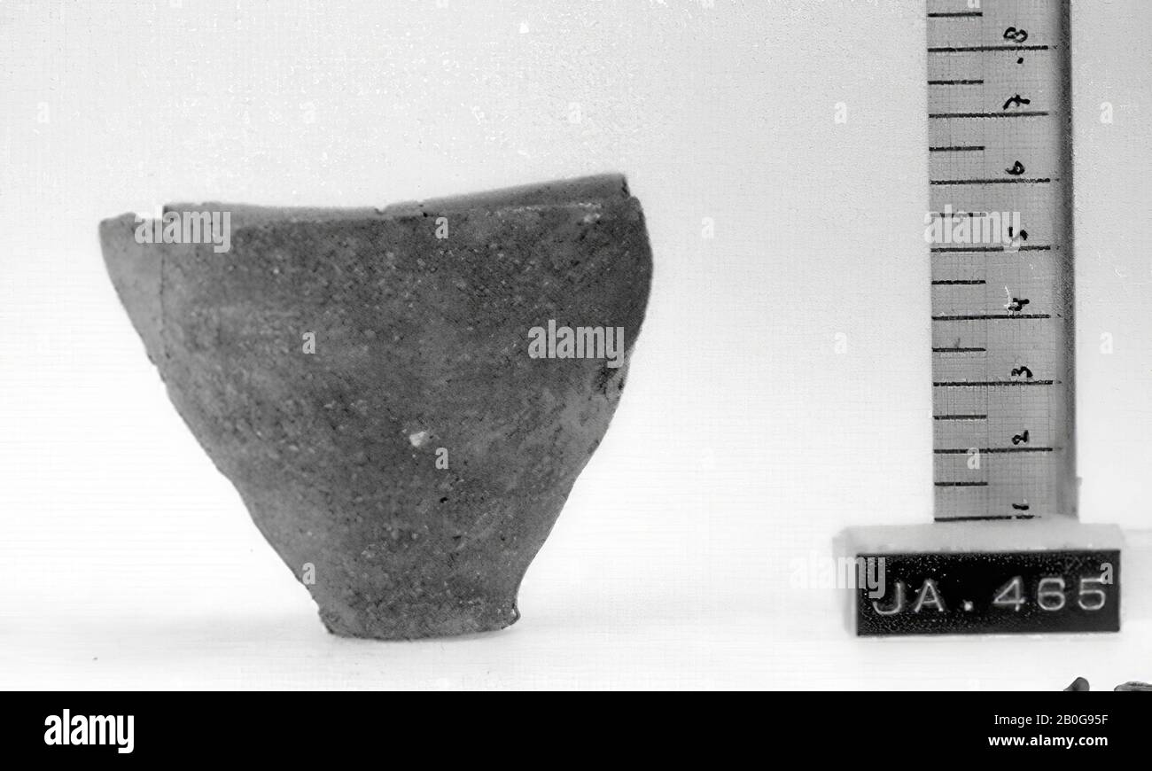 Type: 3, small pottery turned from the mast, bottom unchanged, wall scraping outside, machining inside with fingers rotating, edge single, stale a lot of fine sand, cooked over, slightly oval, incomplete, cup, earthenware, H 7.0, D (bottom) 3, D (max) 9 cm, Uruk Period -3800 Stock Photo