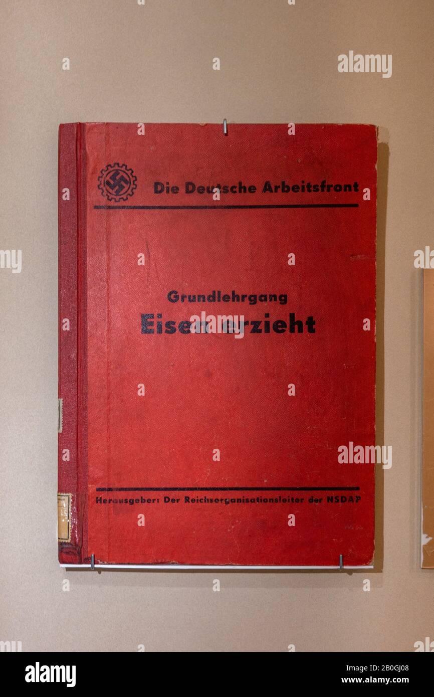 A NSDAP published book on Iron production in the Verkehrsmuseum Nürnberg (Nuremberg Transport Museum), Nuremberg, Bavaria, Germany. Stock Photo