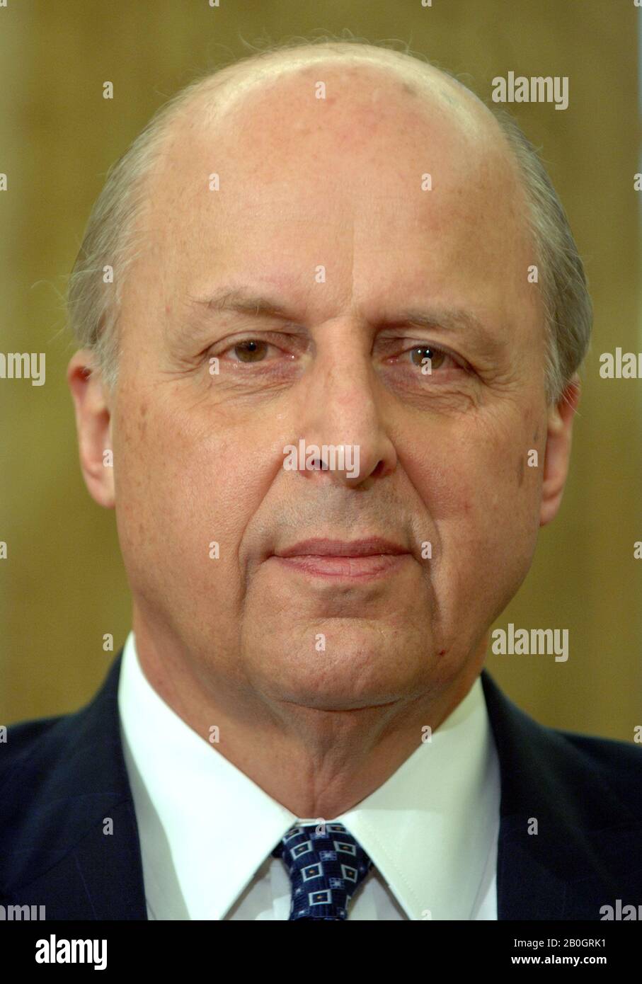 Washington, D.C. - May 8, 2006 -- National Intelligence Director John Negroponte listens as United States President George W. Bush names Air Force General Michael Hayden to be the next Central Intelligence Agency (CIA) Director in the Oval Office of the White House on May 8, 2006. Hayden will replace Porter Goss if confirmed.   Credit: Roger Wollenberg - Pool via CNP / MediaPunch Stock Photo