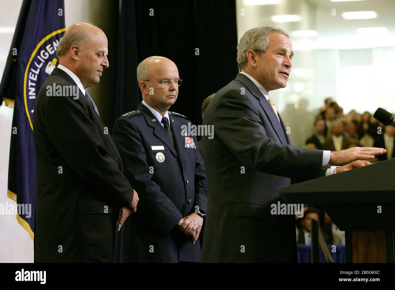 Langley, VA - May 31, 2006 -- United States President George W. Bush, right, speaks during a ceremonial swearing in for new Central Intelligence Agency Director General Michael Hayden, Center, as National Intelligence Director John Negroponte looks on, at CIA headquarters in Langley, Virginia Wednesday 31 May 2006. Hayden, the former head of the super-secret National Security Agency (NSA), was officially sworn-in yesterday in a closed ceremony.Credit: Matthew Cavanaugh-Pool via CNP / MediaPunch Stock Photo
