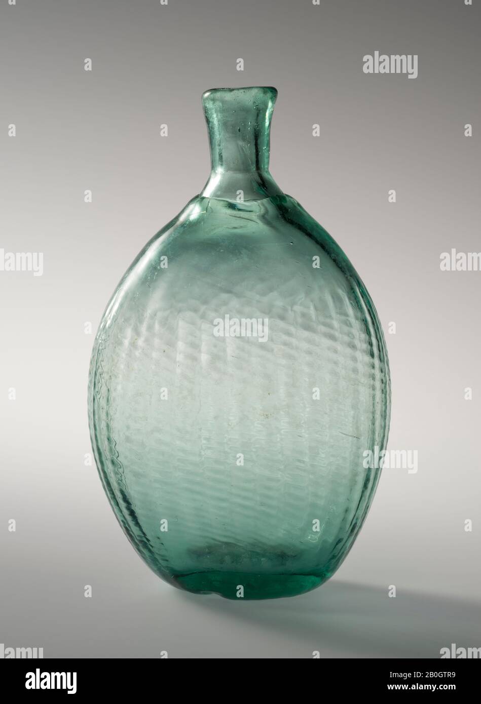 Maker unknown, Pitkin-type Flask, c. 1800–1825, Aquamarine glass, Height: 6 3/8 in. (16.2 cm Stock Photo