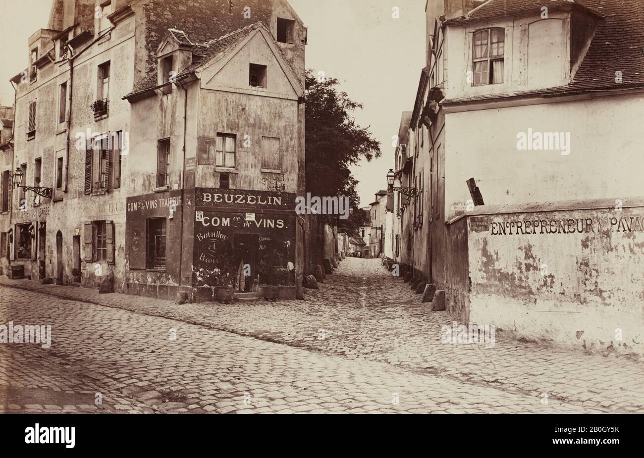Charles Marville, French, 1816–1879, Rue de la Reine-Blanche, from rue des Fossés Saint-Michel, c. 1865-70, Albumen print from glass negative, Overall: 9 5/16 x 14 9/16 in. (23.7 x 37 cm Stock Photo