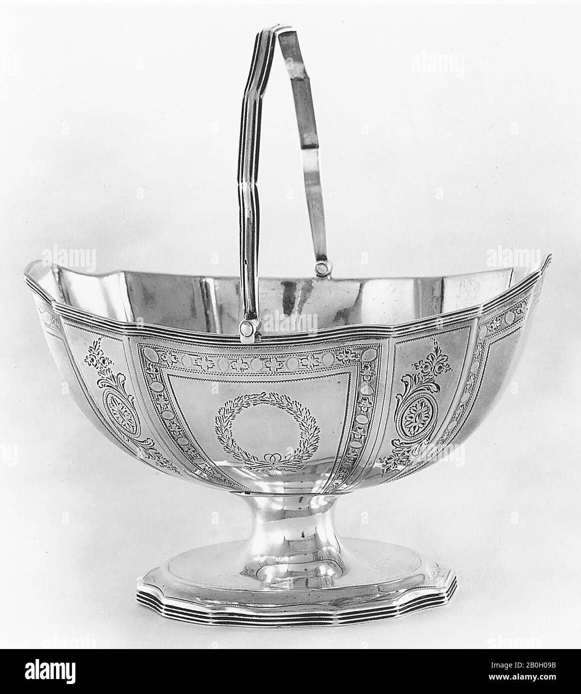 Robert Hennell I and David Hennell II, English, working in partnership 1795–1802, Sugar Basket, 1795/96, Silver, 7 x 6 3/16 x 4 5/8 in. (17.8 x 15.7 x 11.7 cm Stock Photo