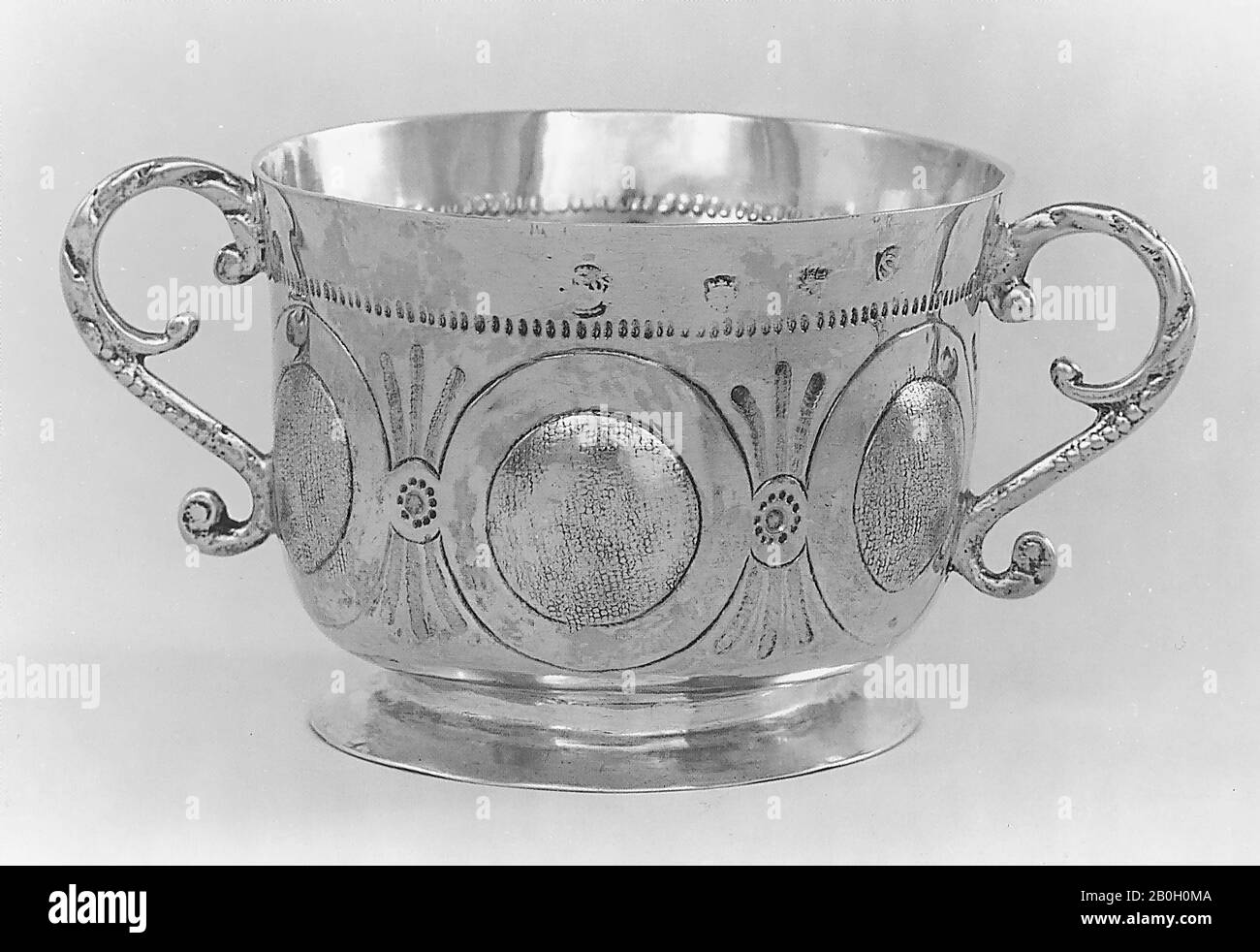 Maker's mark illegible, English, Two-Handled Cup, 1655/56, Silver, 3 1/8 x 6 1/4 x 4 3/16 in. (7.9 x 15.9 x 10.6 cm Stock Photo
