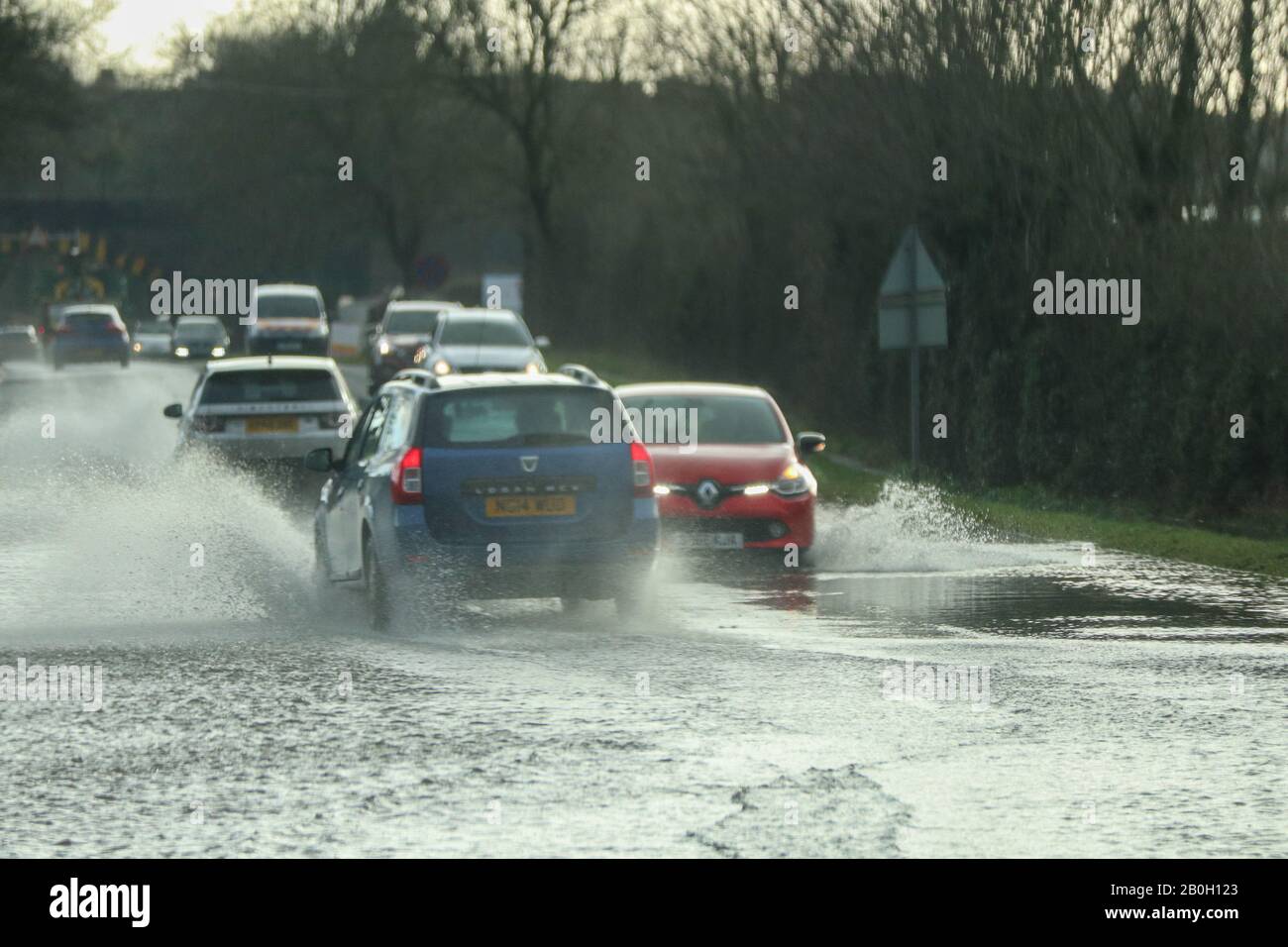 Carnforth Lancashire, United Kingdom. 20th Feb, 2020. Flooding on the A6 caused by run of from surrounding farm land caused River Keer to burst it banks and flood the A6 Credit: Photographing_North/Alamy Live News Stock Photo