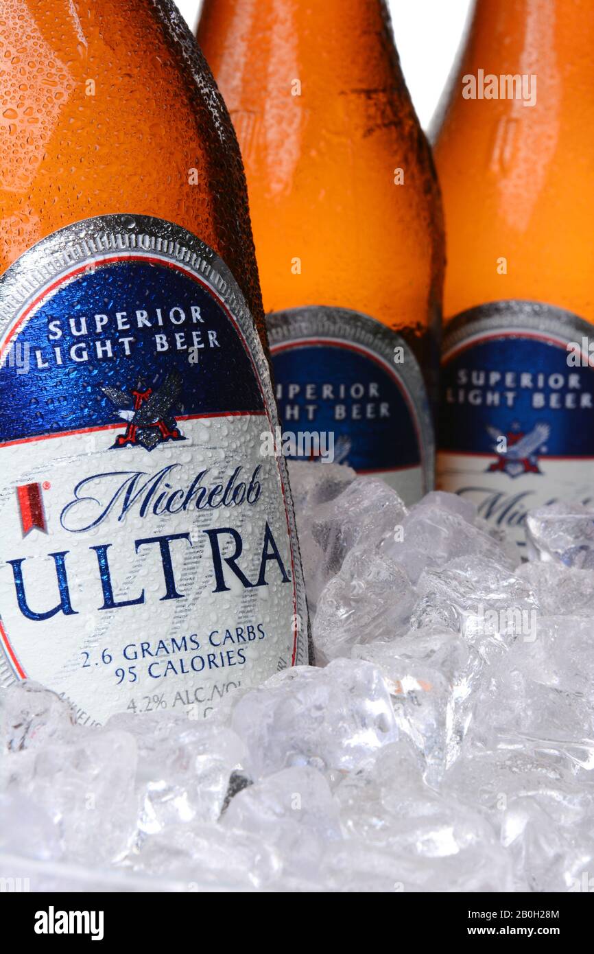 IRVINE, CA - MAY 30, 2014: Closeup of Michelob Ultra bottles in ice. Introduced in 2002 Michelob Ultra is a light beer with reduced calories and carbo Stock Photo