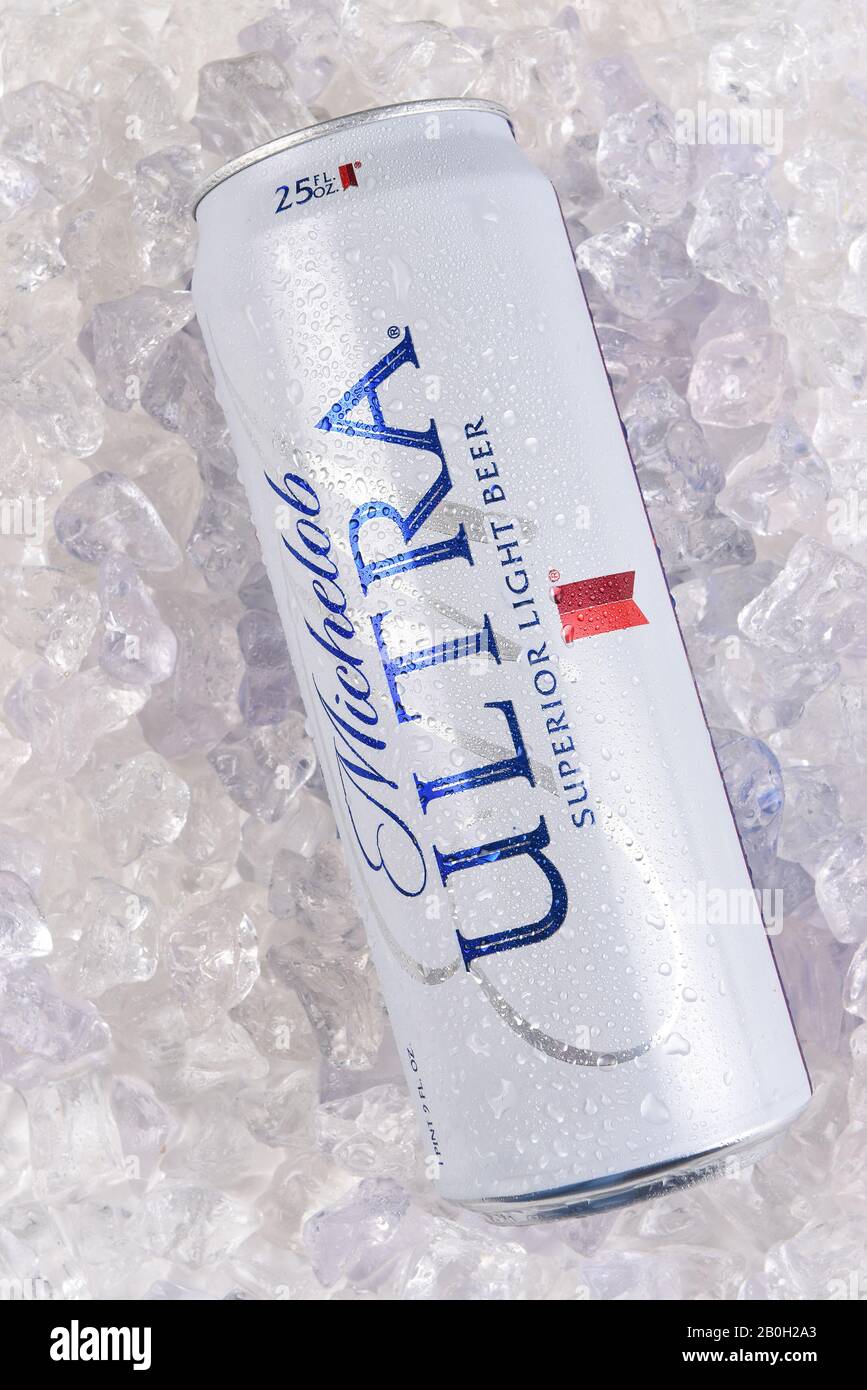 IRVINE, CALIFORNIA - MARCH 21, 2018: A 25 ounce can of Michelob Ultra Beer on ice. A a low carb and low calorie light beer from Anheuser-Busch. Stock Photo