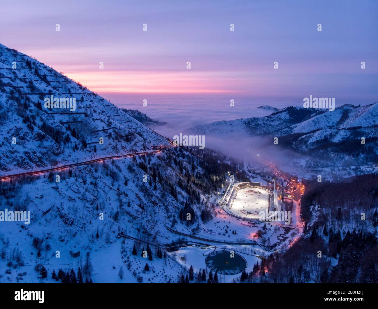 ALMATY, KAZAKHSTAN - FEBRUARY 19, 2020: View of the Medeo ice rink late at night. Winter in the mountains of Zailiysky Alatau. Small Almaty Gorge. Lat Stock Photo