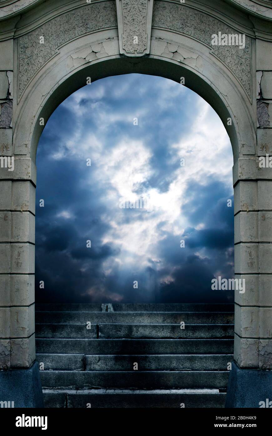 mystical gate with stairs and heavenly sky Stock Photo