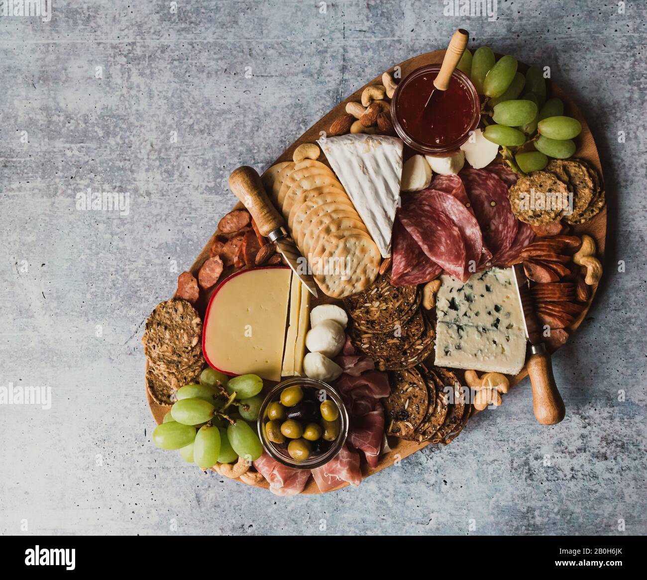 Top view of charcuterie board of meat and cheese on stone counter Stock  Photo - Alamy