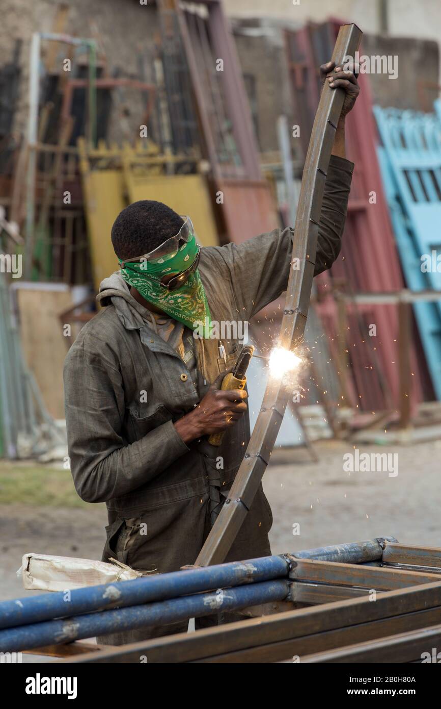 07.11.2019, Adama, Oromiyaa, Ethiopia A locksmith welds gates and