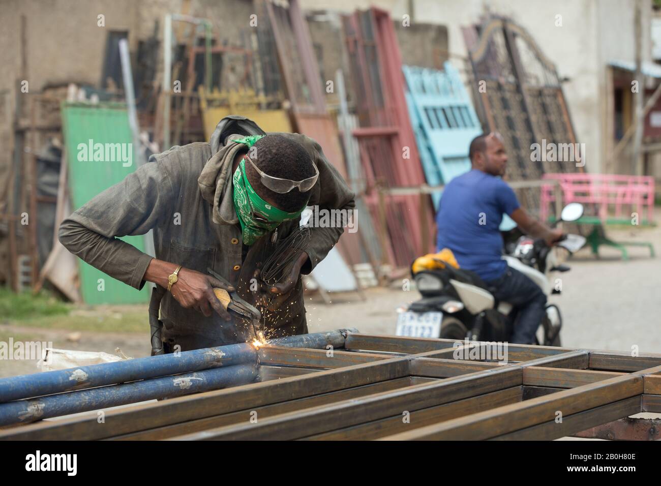 07.11.2019, Adama, Oromiyaa, Ethiopia A locksmith welds gates and