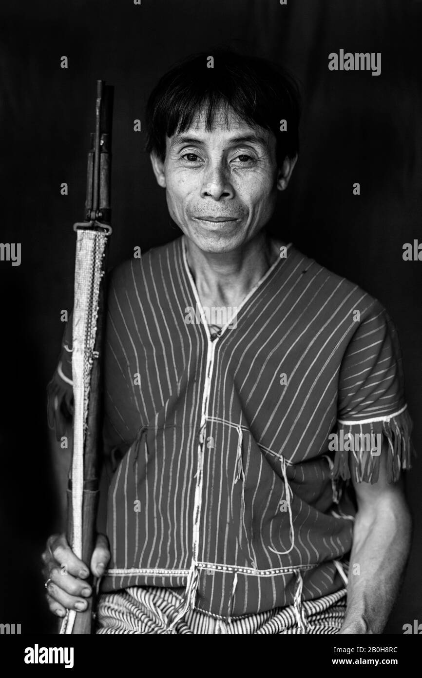A Portrait Of Mr Munney (The Village Hunter) From The Kayaw Ethnic Group, Htay Kho Village, Loikaw, Myanmar. Stock Photo