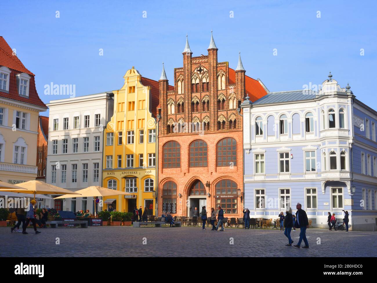 Stralsund, Germany 10-23-2019 view to the old market in the city center with the architecture and people passing Stock Photo