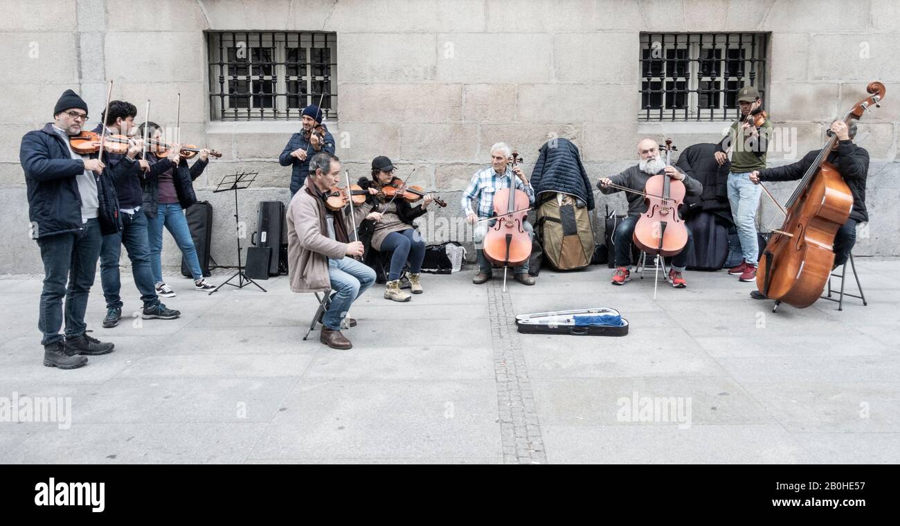 Classical musicians busking in Madrid, Spain Stock Photo