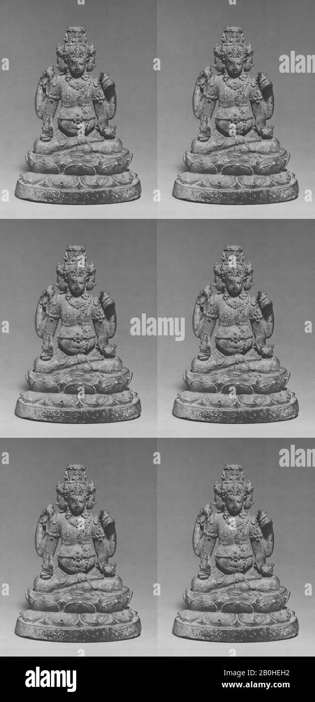 Seated Four-Headed and Four-Armed Jambhala(?), the Buddhist God of Wealth, Indonesia (Java), Central Javanese period, Date late 9th–early 10th century, Indonesia (Java), Bronze, H. 4 4/5 in. (12.2 cm), Sculpture Stock Photo