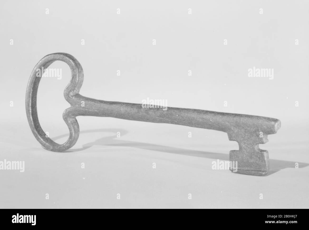 Key, probably Italian, 17th–18th century, probably Italian, Wrought iron, Overall: 6 1/4 × 2 1/4 × 3/8 in. (15.9 × 5.7 × 1 cm), Metalwork-Iron Stock Photo
