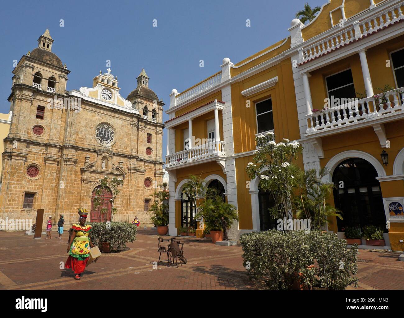 Iglesia de San Pedro Claver and colonial building on Plaza San Pedro Claver within walled city (Las Murallas) of Cartagena, Colombia Stock Photo