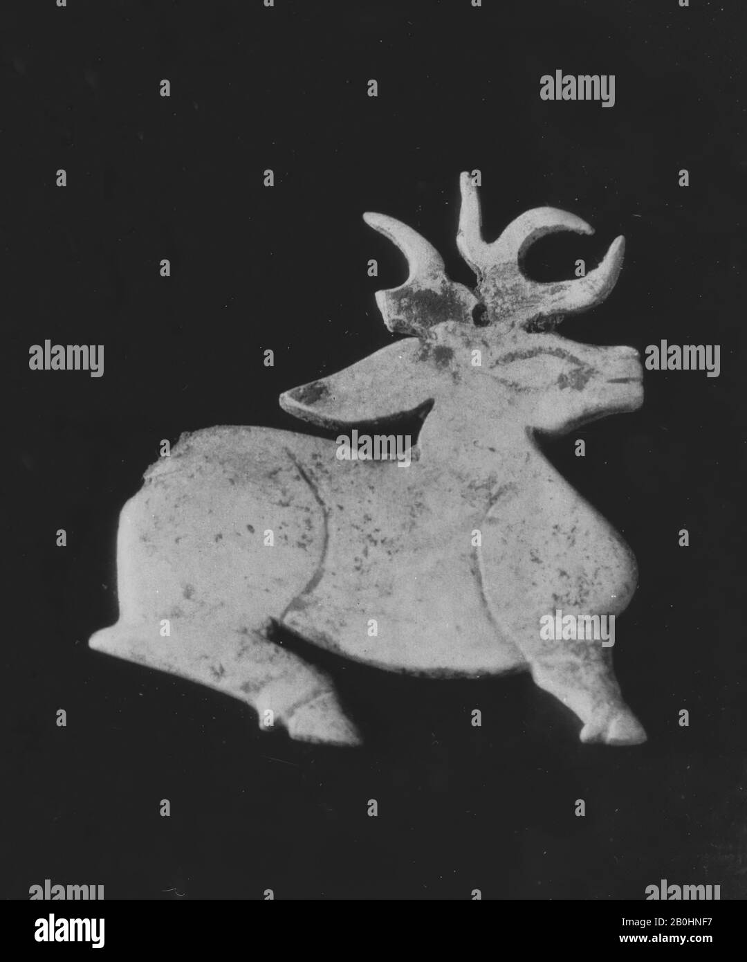 Deer, China, Western Zhou dynasty (1046–771 B.C.), Date 11th–9th century B.C., China, Jade (nephrite), H. 1 5/8 in. (4.1 cm); W. 1 7/8 in. (4.8 cm), Jade Stock Photo