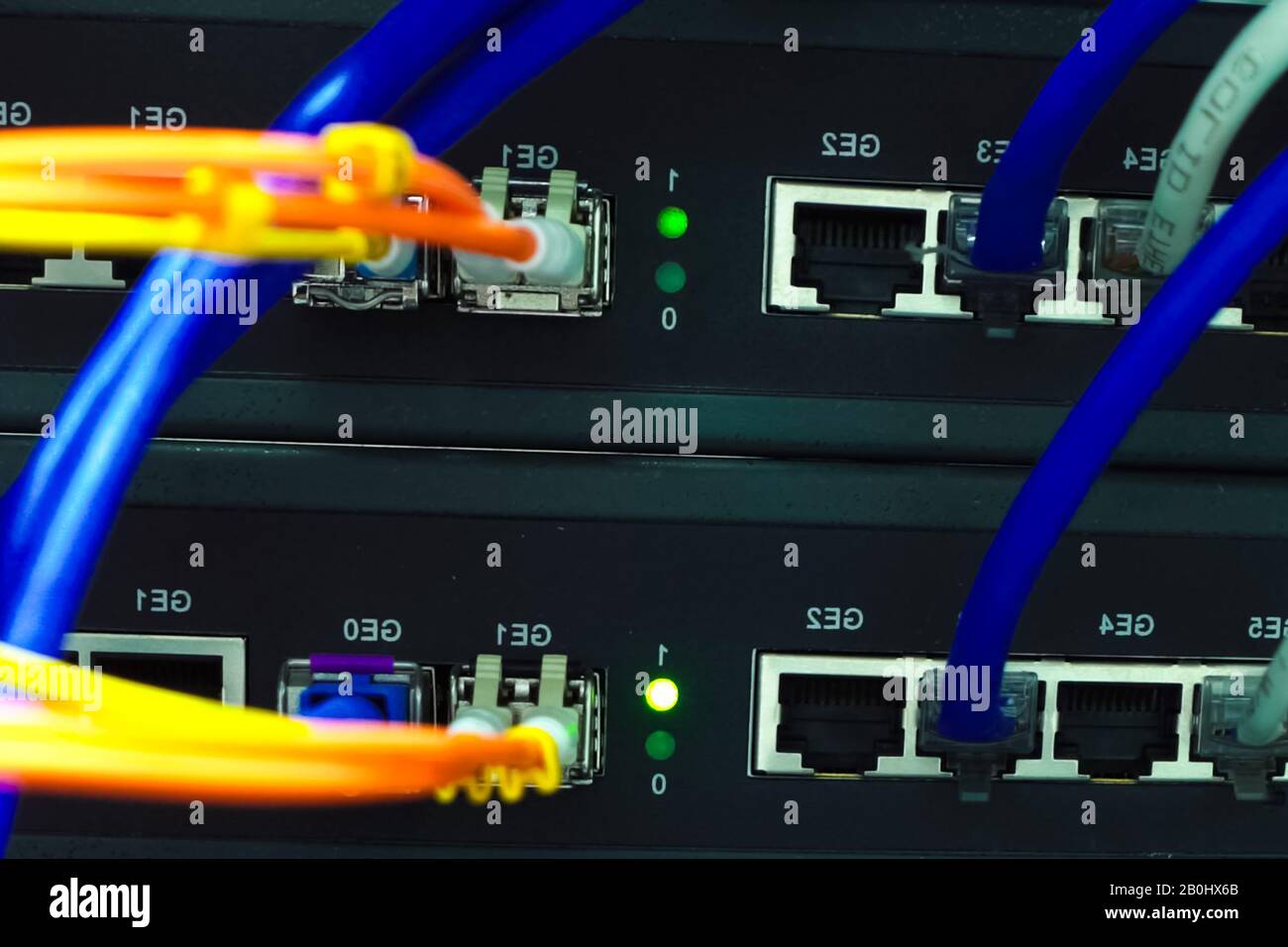 A working server. Internet wires and flashing lights on the server ...