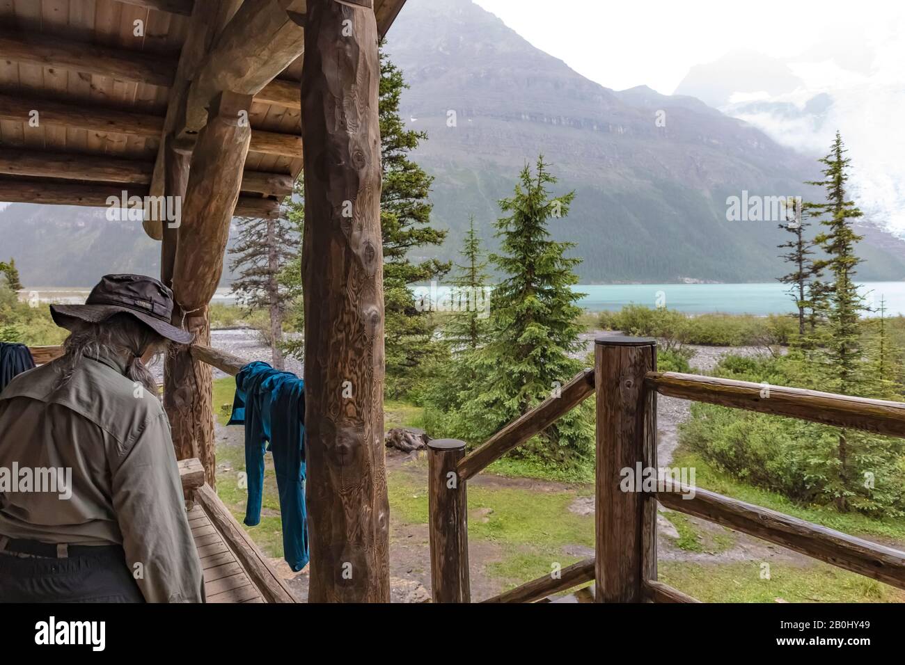 Front porch of Hargreaves Shelter during rainstorm, on Berg Lake in Mount Robson Provincial Park, British Columbia, Canada Stock Photo