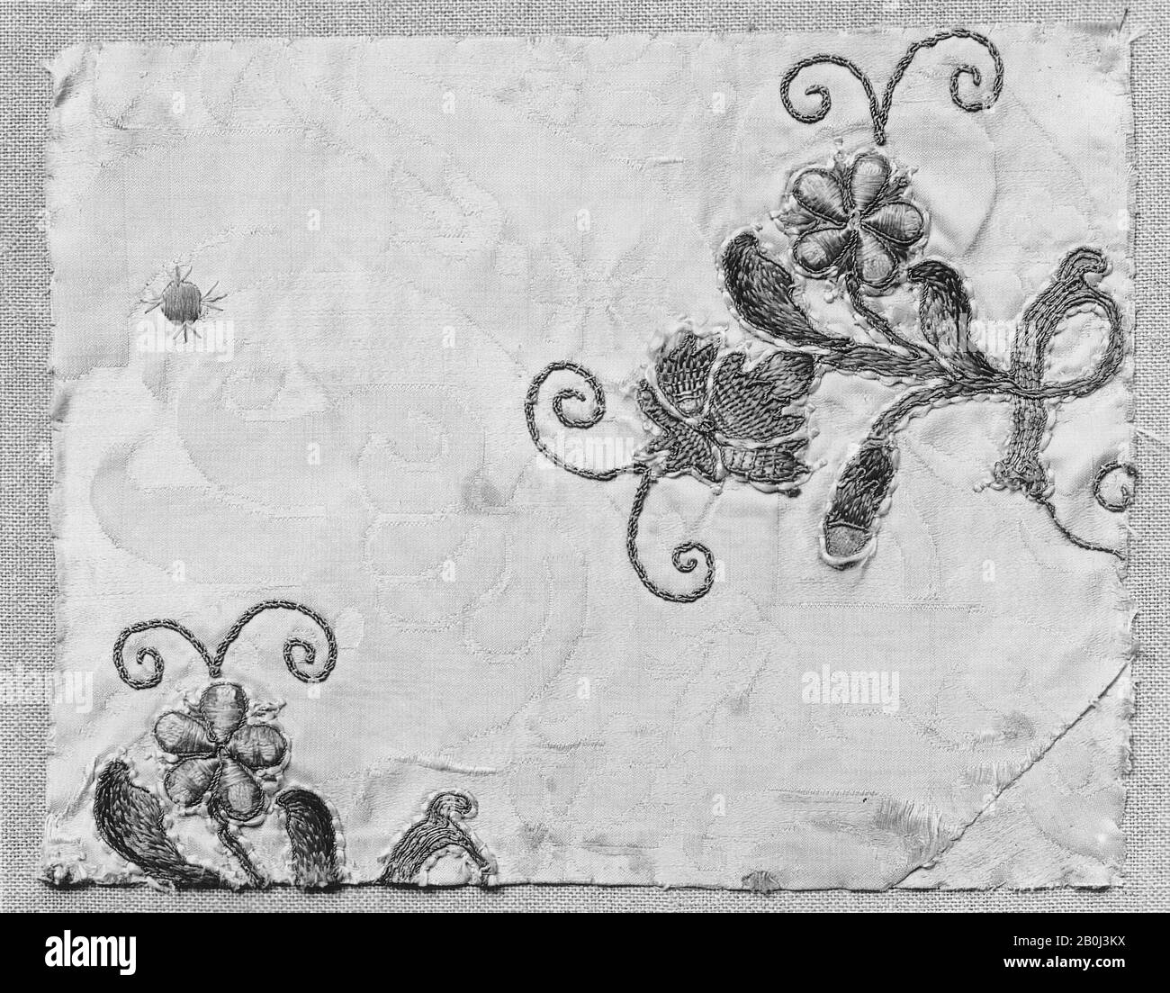 Fragment, Italian, 17th–18th century, Italian, Silk and metal thread on silk, L. 8 x W. 9 3/4 inches (20.3 x 24.8 cm), Textiles-Embroidered Stock Photo