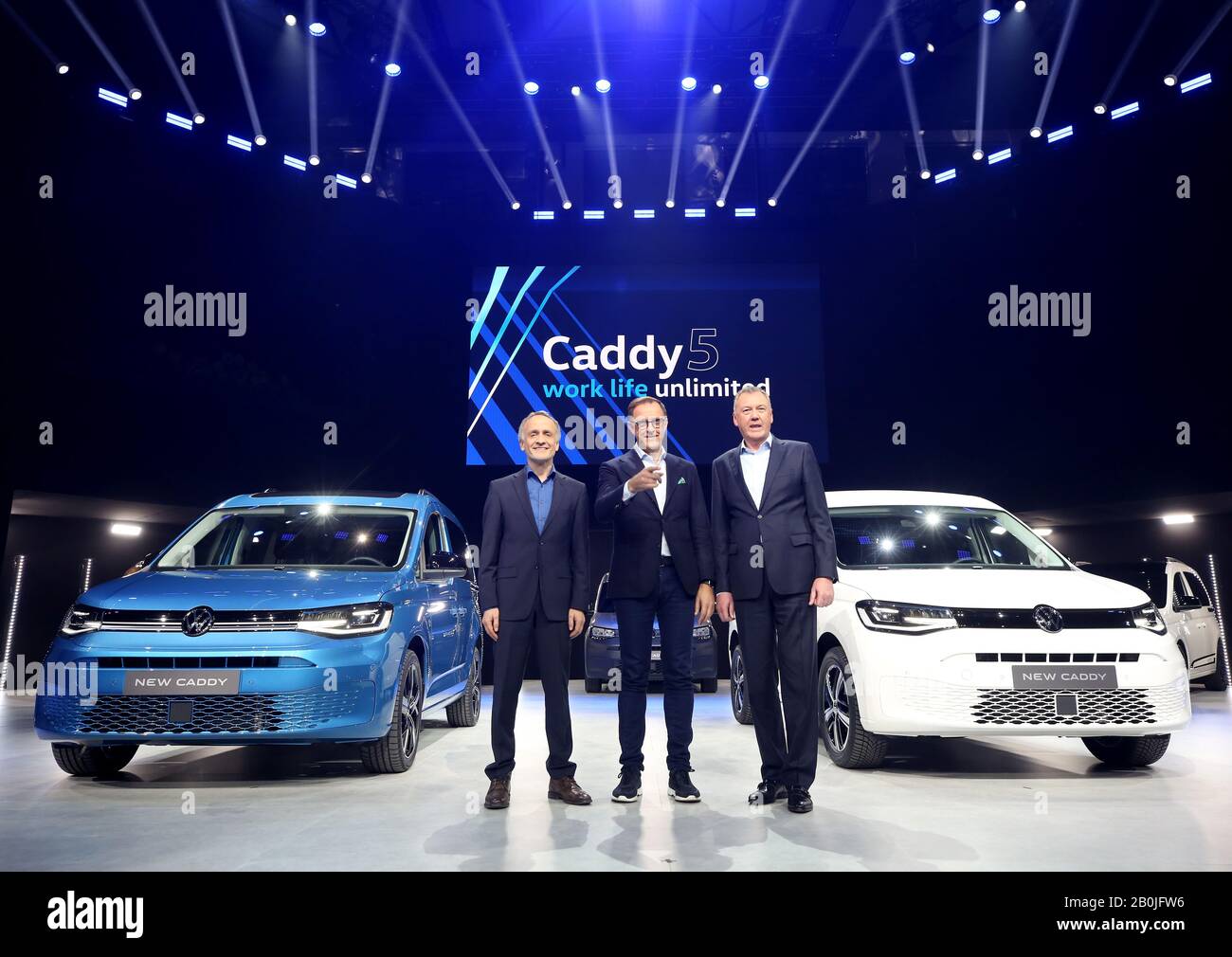 Duesseldorf, Germany. 20th Feb, 2020. Albert Kirzinger (l-r), Head of Volkswagen Commercial Vehicle Design, Thomas Sedran, Chairman of the Board of Management of Volkswagen Commercial Vehicles, and Heinz Löw, Member of the Board of Management of Volkswagen Commercial Vehicles for Sales and Marketing, present the new VW Caddy 5, with Caddy Life on the left and Caddy Cargo on the right. Credit: Roland Weihrauch/dpa/Alamy Live News Stock Photo