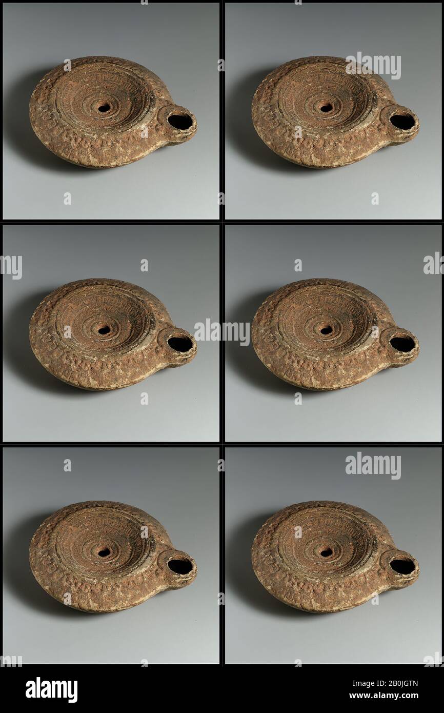 Terracotta oil lamp, Roman, Cypriot, Roman, Cypriot, Terracotta, Overall: 1 x 3 1/4 in. (2.5 x 8.3 cm), Terracottas Stock Photo