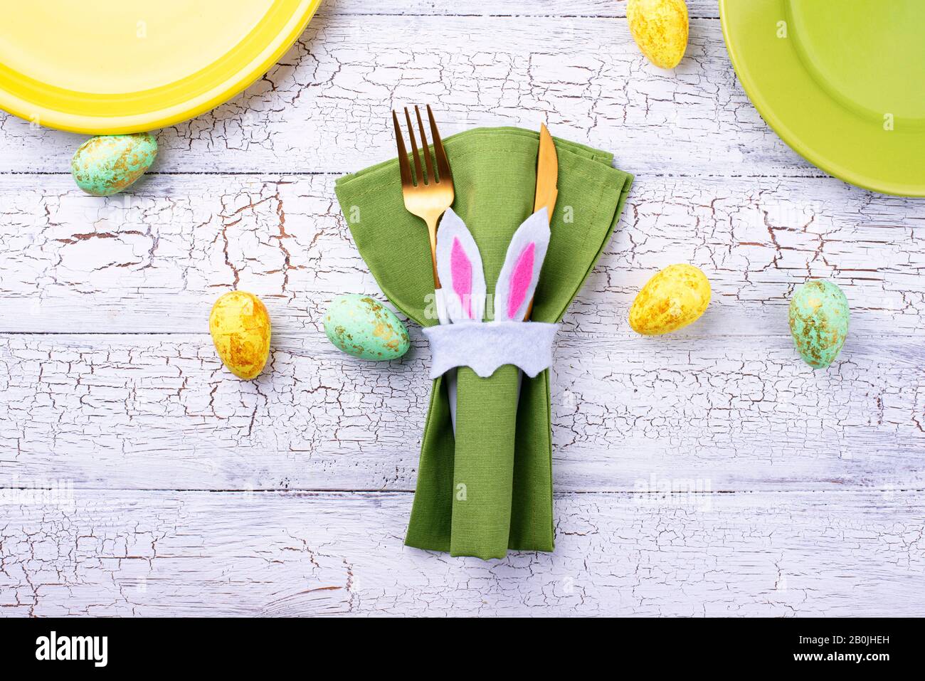 Easter table setting in green color Stock Photo