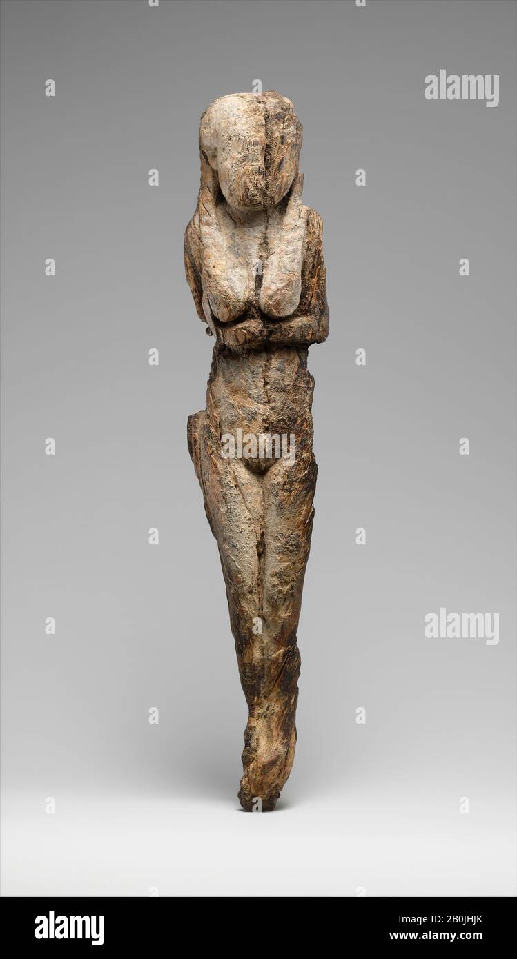 Statuette of a Standing Woman, Early Dynastic Period, Probably Dynasty 1, ca. 3100–2900 B.C., From Egypt, Northern Upper Egypt, Abydos, Osiris temple, Ivory, H. 25.2 x W. 5.1 x D. 3.6 cm (9 15/16 x 2 x 1 7/16 in Stock Photo