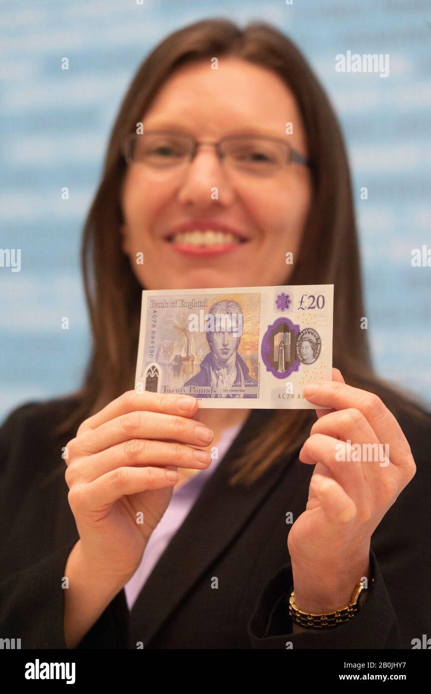 London, Britain. 20th Feb, 2020. Bank of England Chief Cashier Sarah John poses for photographs with the new 20 pound note at Tate Britain in London, Britain, on Feb. 20, 2020. Deemed as 'the most secure ever' note issued by the Bank of England, the latest 20 pound note has gone into circulation Thursday. The new polymer note features the famous English watercolor artist Joseph Mallord William Turner. Credit: Ray Tang/Xinhua/Alamy Live News Stock Photo