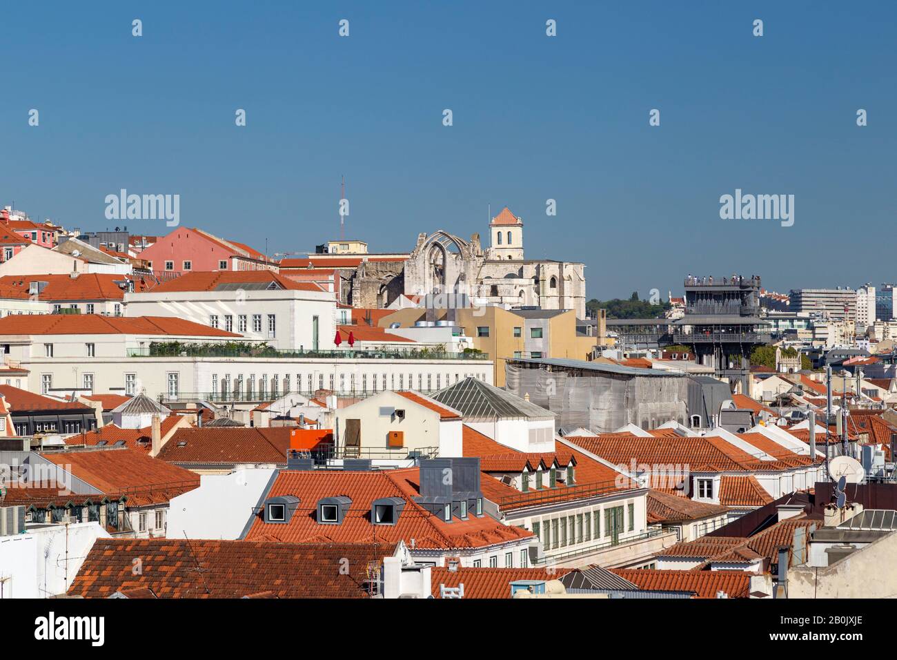 View of the historic and medieval Convento do Carmo (Carmo Convent), Elevador de Santa Justa and old buildings in downtown Lisbon, Portugal. Stock Photo