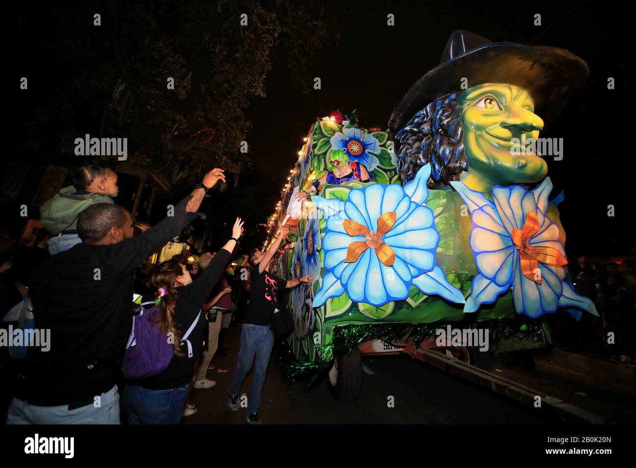 New Orleans, USA. 19th Feb, 2020. People watch a float during the Krewe ...