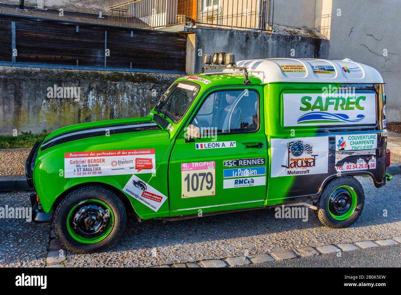 Colourful Renault 4L camionette (small van) for rallying with sponsored advertising - Argenton-sur-Creuse, Indre, France. Stock Photo