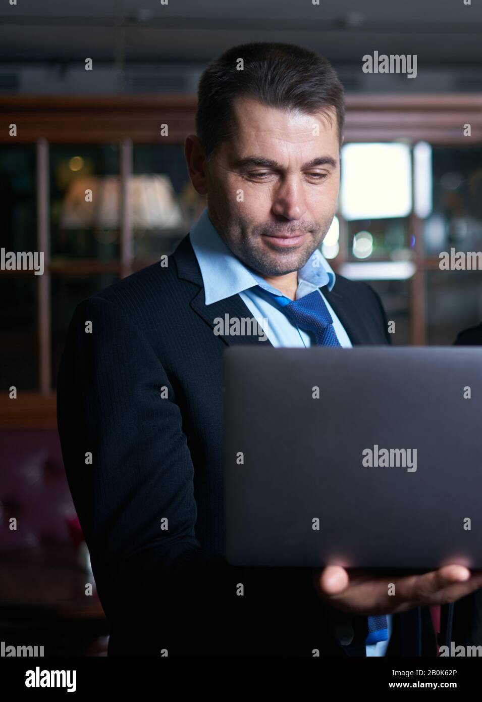 business man working with documents and laptop Stock Photo