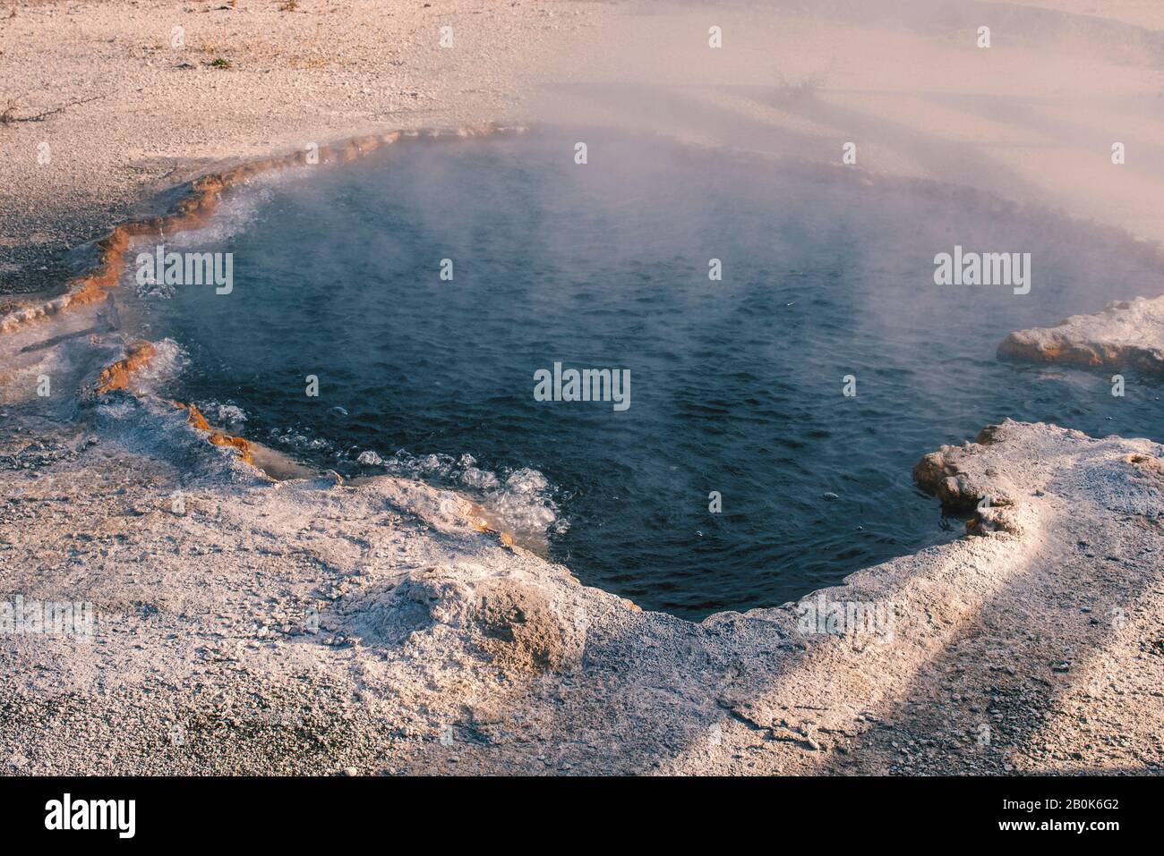 Steam rising up off the hot springs. Stock Photo