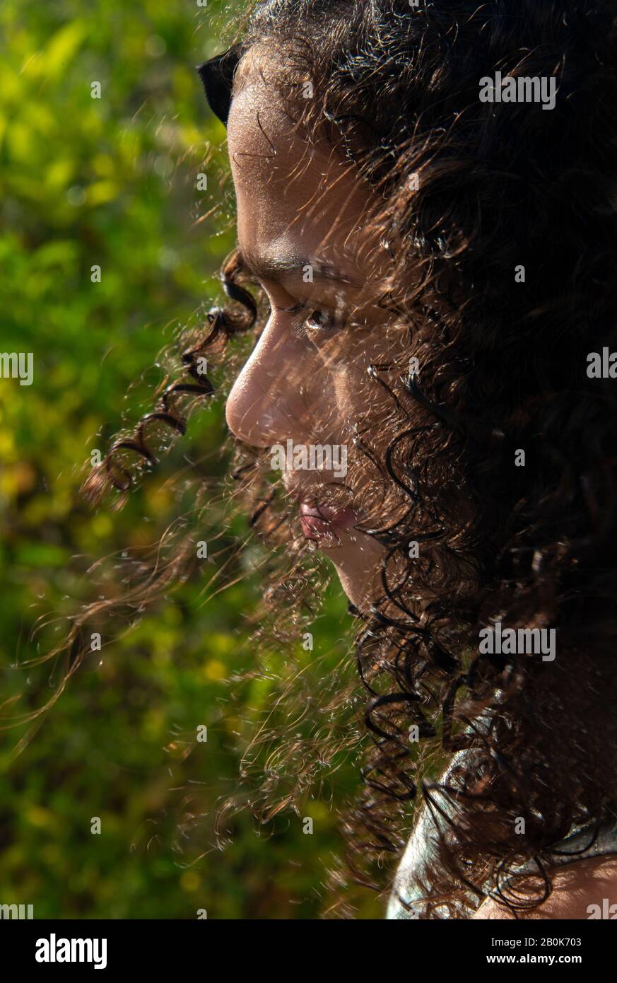 Profile of a Saudi Arabian girl with curly hair Stock Photo