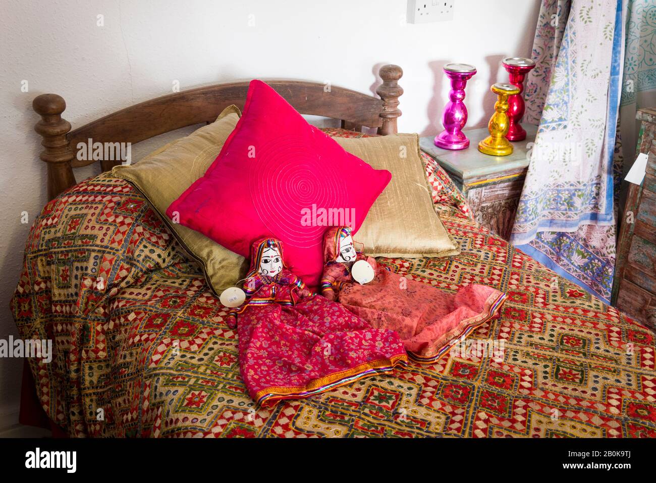 Two Indian dolls for sale in a specialist shop selling goods from India in Honeystreet Wiltshire England UK Stock Photo