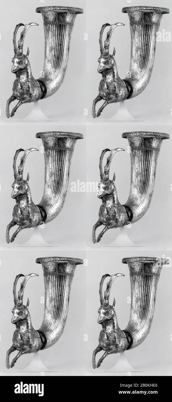 Rhyton terminating in the forepart of a wild goat, Iran, ca. 4th–2nd century B.C., Iran, Iran, Silver, 9.45 x 7.87 in. (24 x 19.99 cm), Metalwork-Vessels Stock Photo