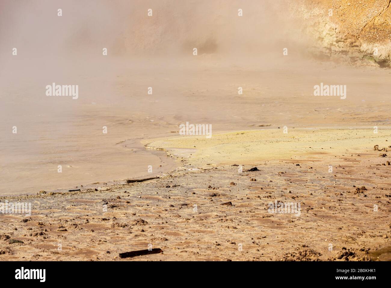 Yellow brown muddy hot spring. Stock Photo