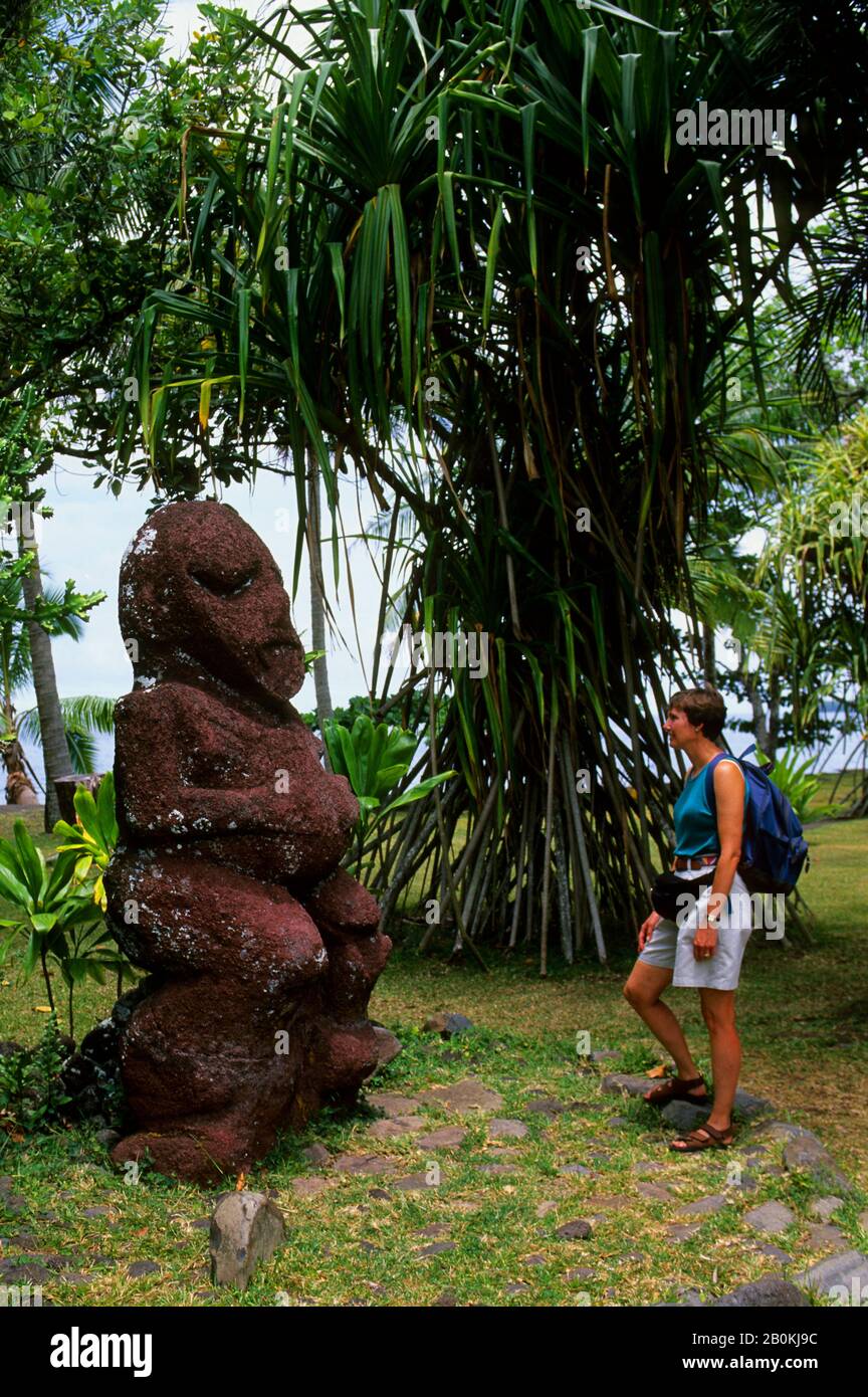 FRENCH POLYNESIA, SOCIETY ISLANDS, TAHITI, PAUL GAUGUIN MUSEUM, TIKI STATUE, TOURIST, MODEL RELEASED Stock Photo