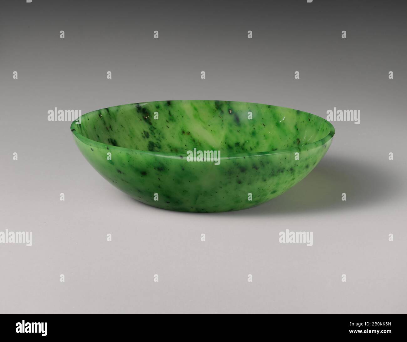 Bowl, Russia, 1883, Russia, Nephrite, variegated pear-leaf green with tiny specks of black, H. 1 5/16 in. (3.4 cm); W. 4 13/16 in. (12.2 cm), Jade Stock Photo