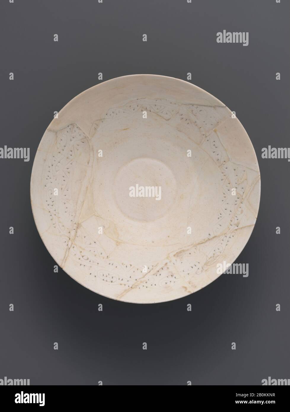 Bowl, 12th century, Attributed to Iran, Composite body; incised, H. 3 in. (7.6 cm), Diam. 7 15/16 in. (20.2 cm), Wt. 8.4 oz. (238.2 g), Ceramics Stock Photo