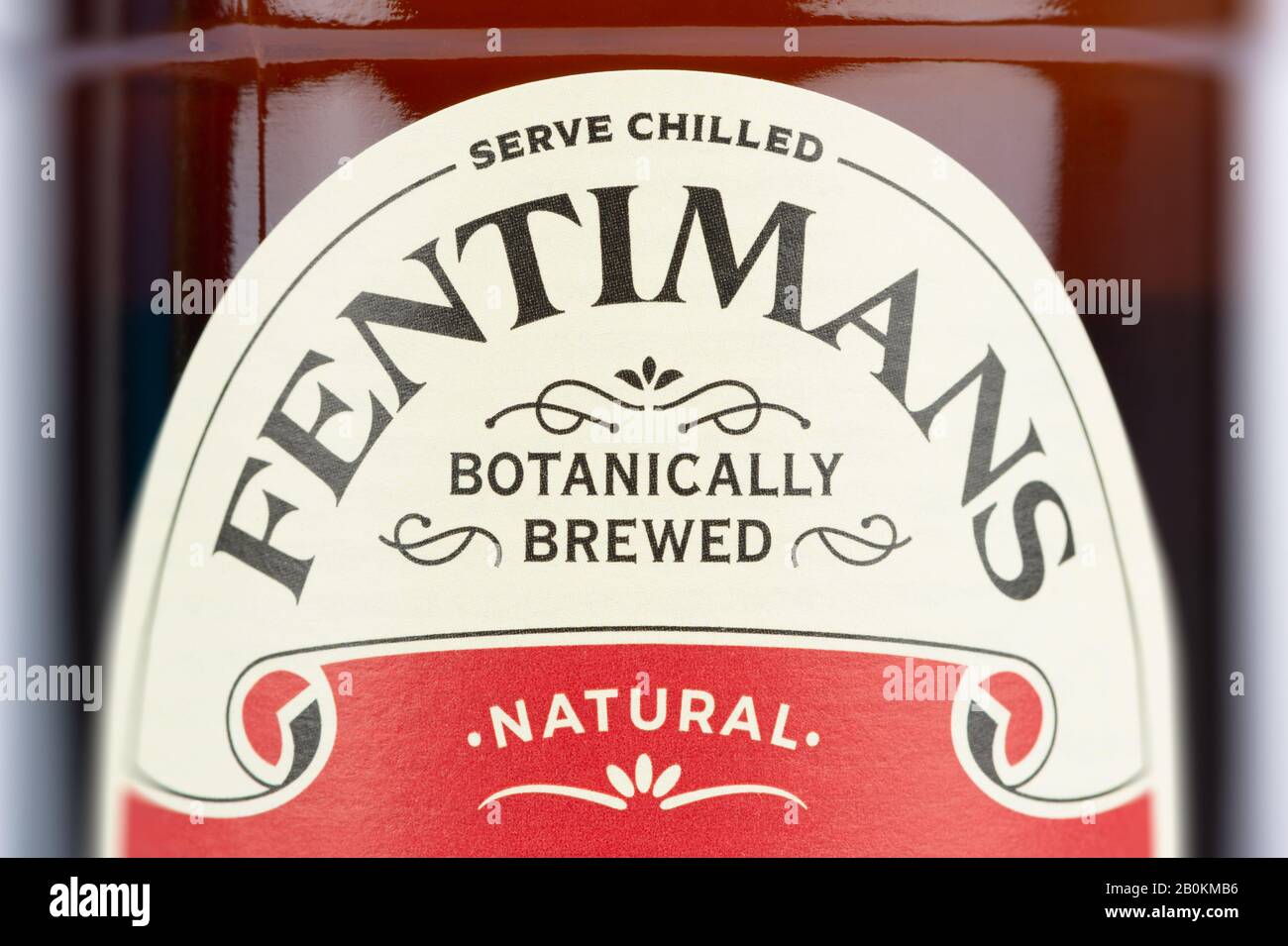 A close up of the brand logo as seen on a bottle of Fentimans Ginger Beer shot on a white background. Stock Photo