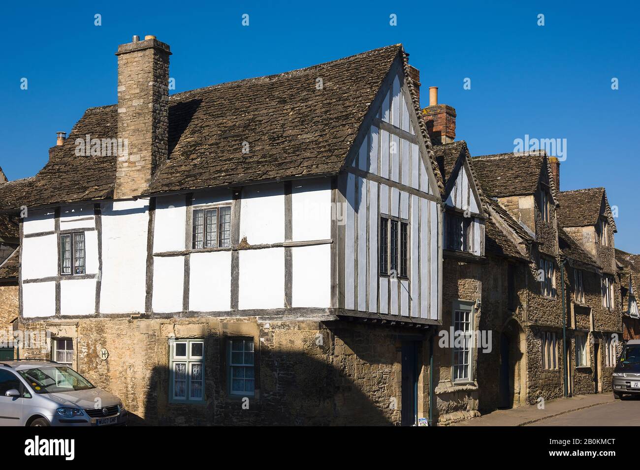 An outstanding period cottage on a corner of East Street and High Street in the much-visited English village of Lacock in Wiltshire England UK Stock Photo